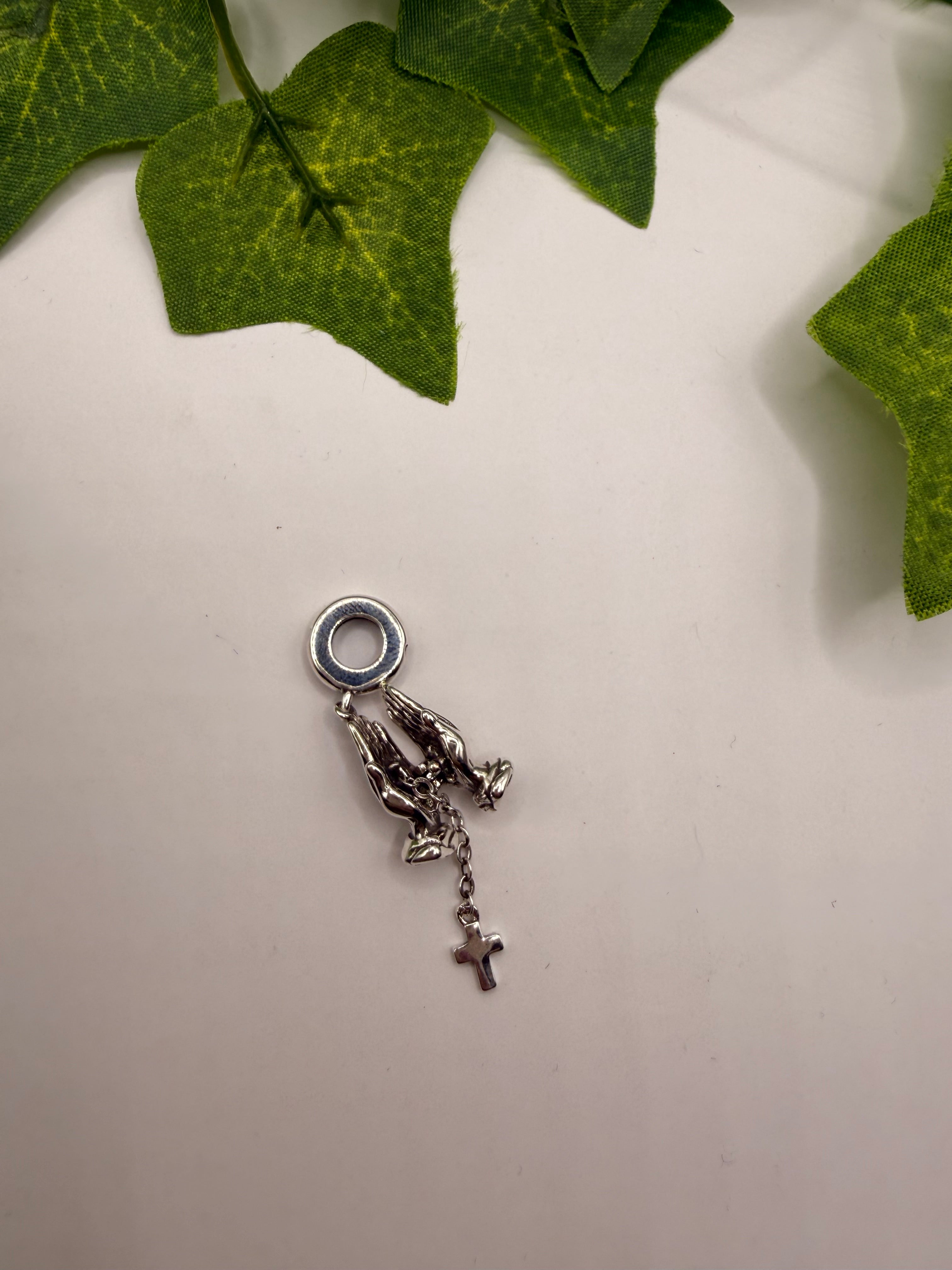 Praying hands religious charm